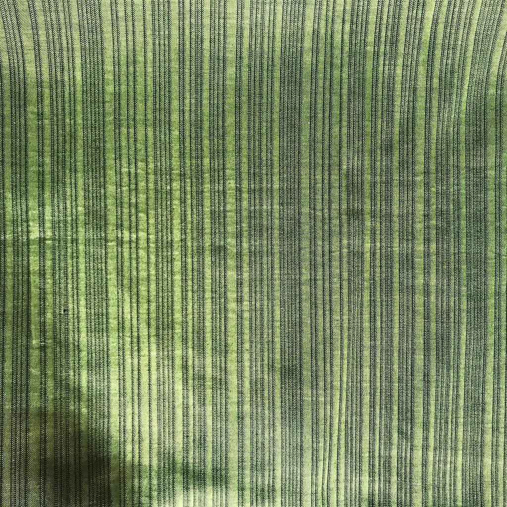 Miete - grüner Dekostoff mit lila Faden